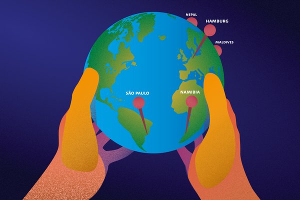 Two hands are holding a globe with five marked locations.